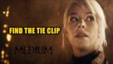 Find the tie clip The Medium